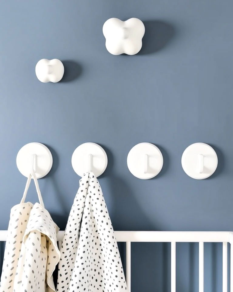aesthetic white wall hooks - 15 White Nursery Ideas