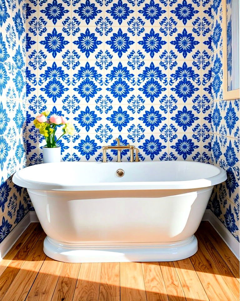 bathtub area with blue and white mediterranean tiles - 40 Bathtub Tile Ideas