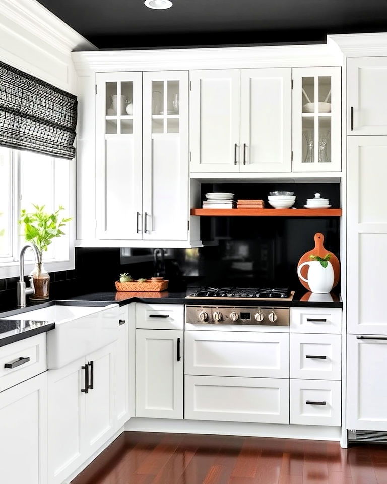 black countertops and white cabinets combo - 25 Dark Kitchen Ideas