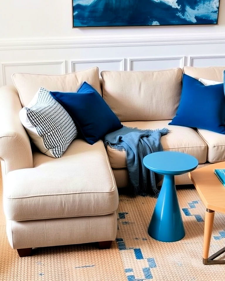 blue accessories and soft beige sofa - 20 Blue and Beige Living Room Ideas