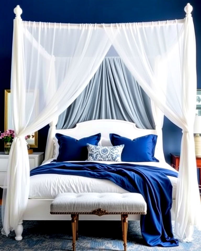 blue bedding and white canopy bed - 25 Blue and White Bedroom Ideas