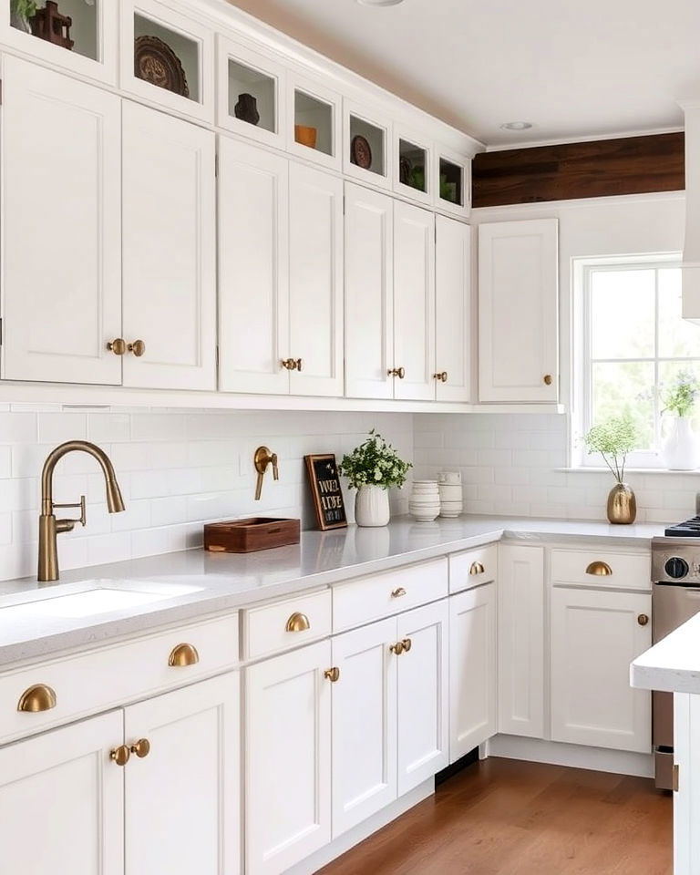 brass hardware and rustic white cabinets - 20 Rustic White Kitchen Ideas