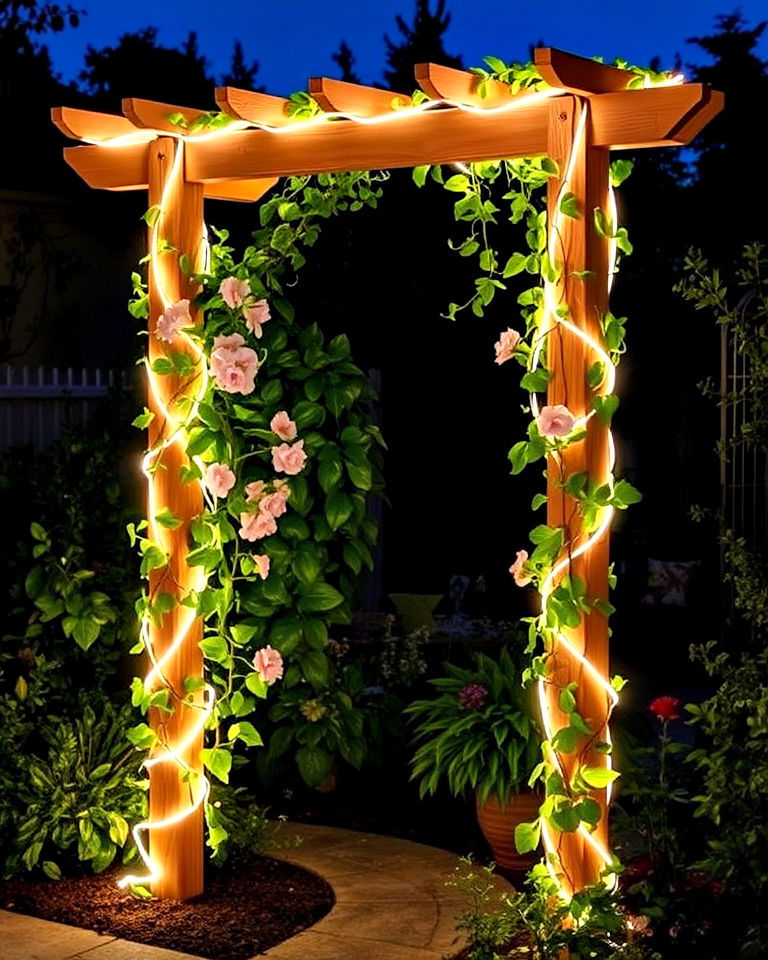 climbing plants with illuminated trellises - 40 Garden Lighting Ideas
