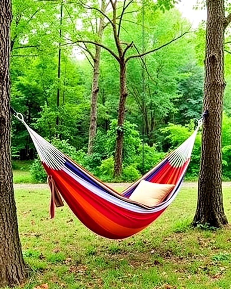 cozy hanging hammock for relaxation - 30 Rv Campsite Decorating Ideas