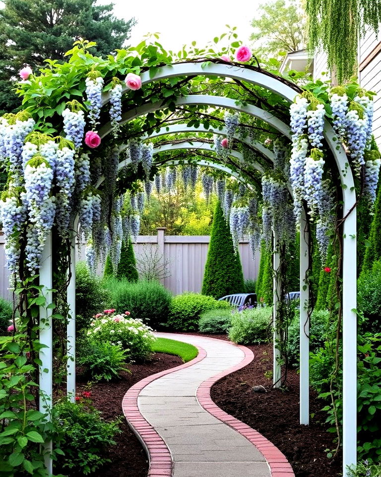 curved pathway with trellis overhead - 25 Curved Walkway Ideas