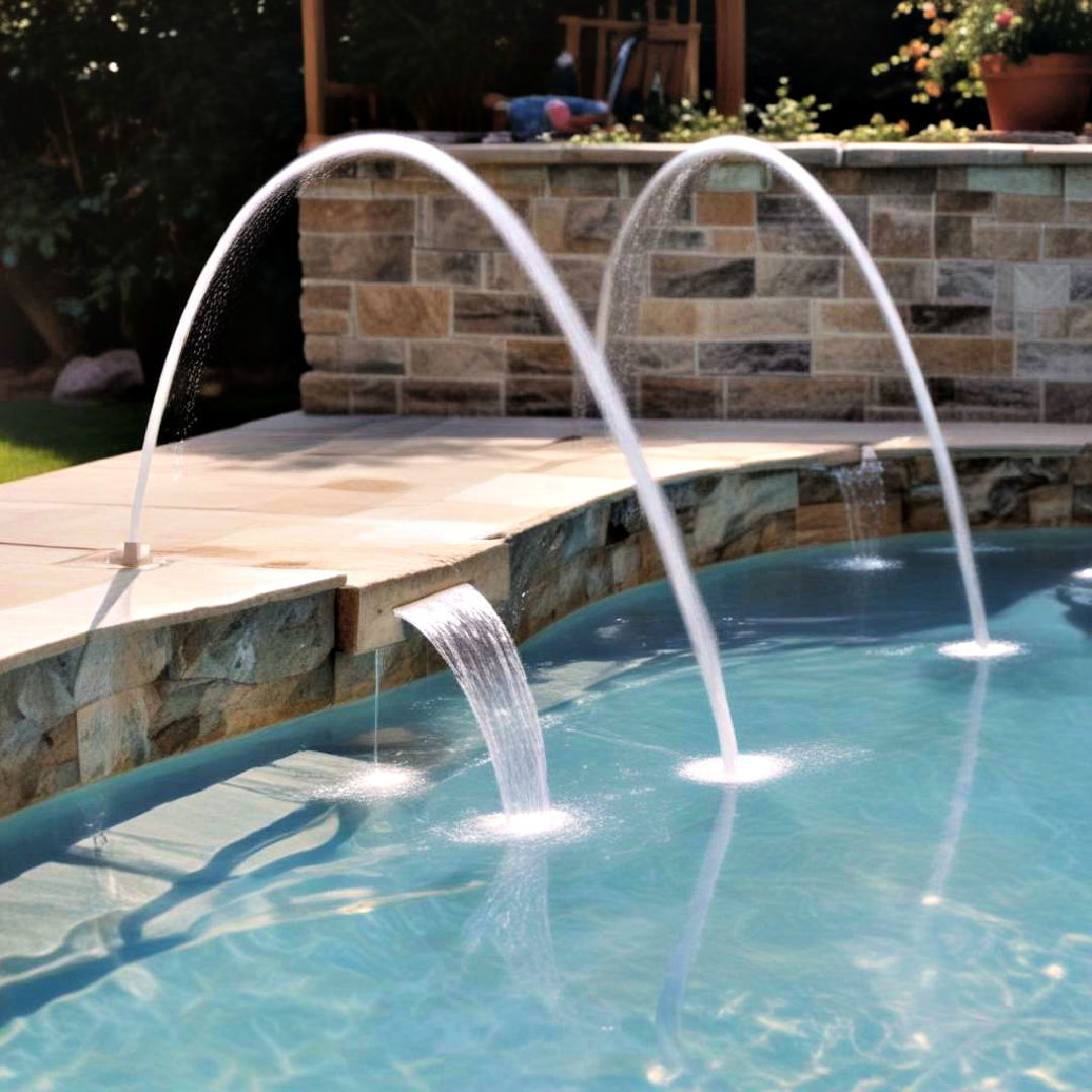 deck jets to create playful effect - 15 Pool Fountain Ideas