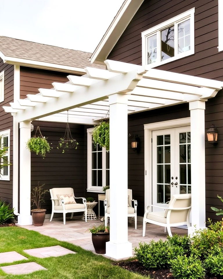 elegant deep espresso walls and white pergola - 25 Dark Brown House Exterior Ideas