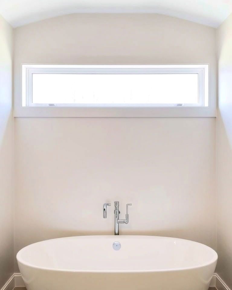 elegant narrow transom windows - 20 Windows Above Bathtub Ideas