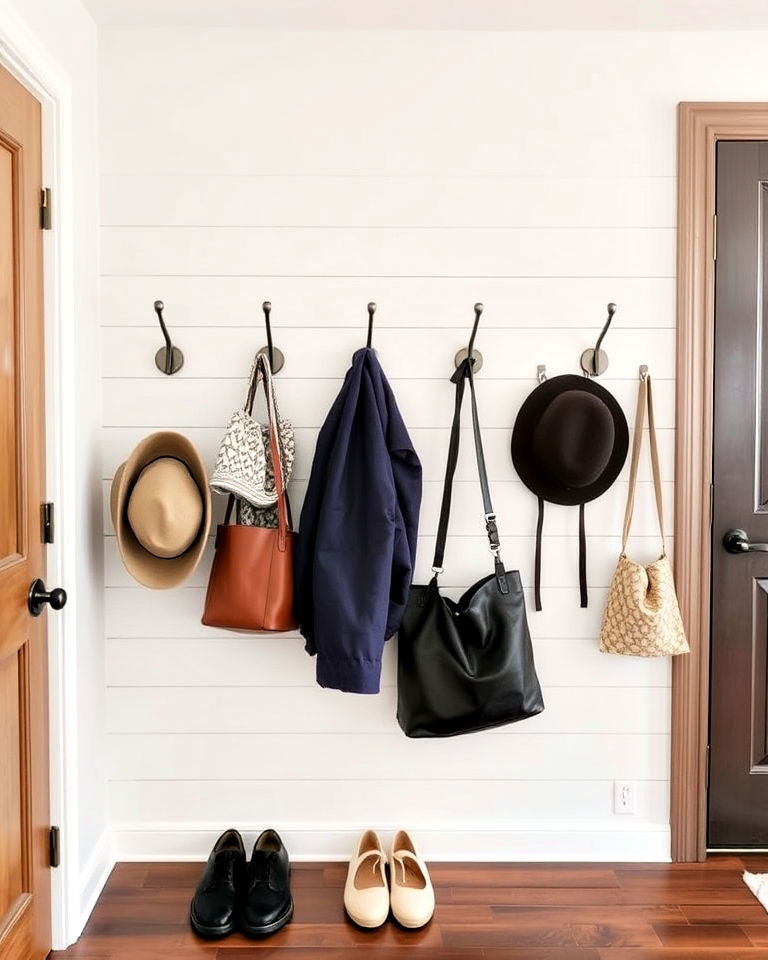 entryway with shiplap half wall and hooks - 25 Shiplap Wall Entryway Ideas