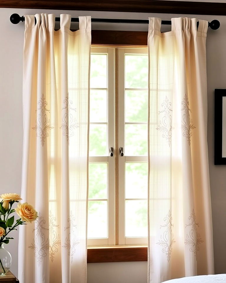 farmhouse window with embroidered panels - 40 Farmhouse Window Treatment Ideas