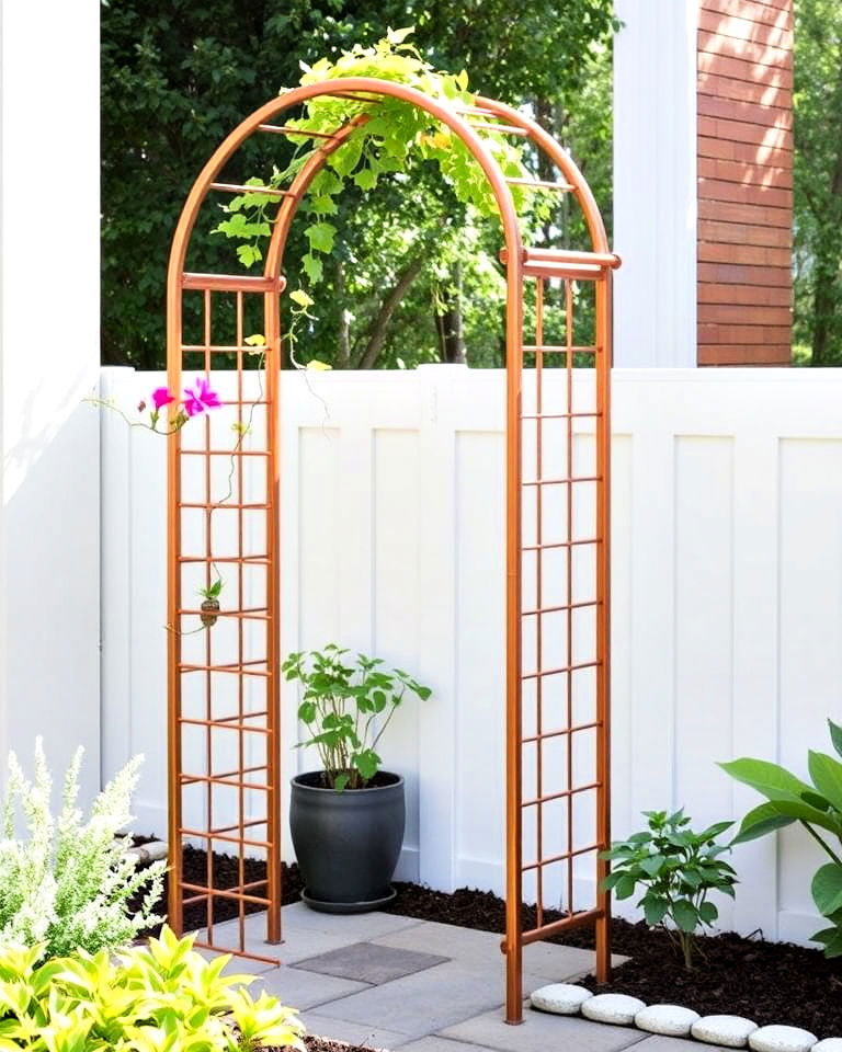 garden with copper trellis arbor - 40 Garden Arbor Ideas