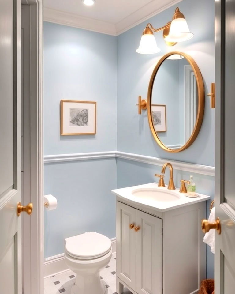 gold accents and soft powder blue walls - 20 Blue Powder Room Ideas