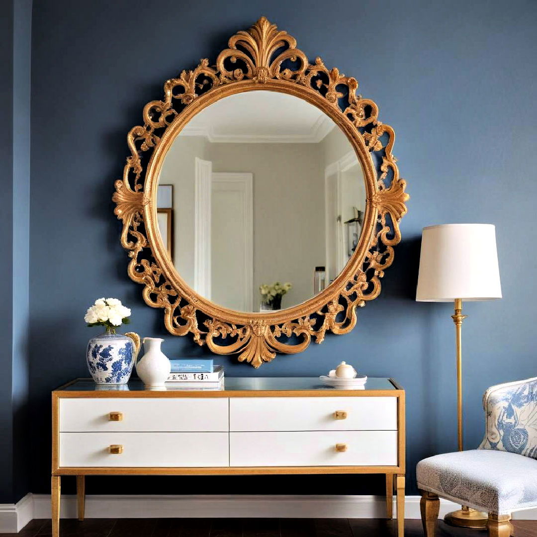 golden statement mirror - 20 Blue and Gold Bedroom Ideas