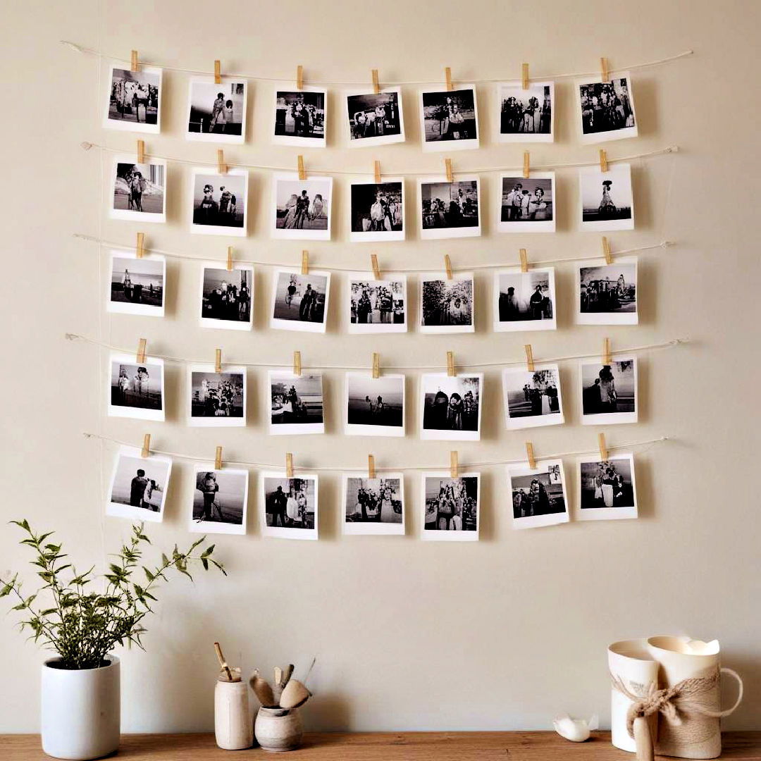 hanging string photos wall display - 40 Photo Wall Ideas