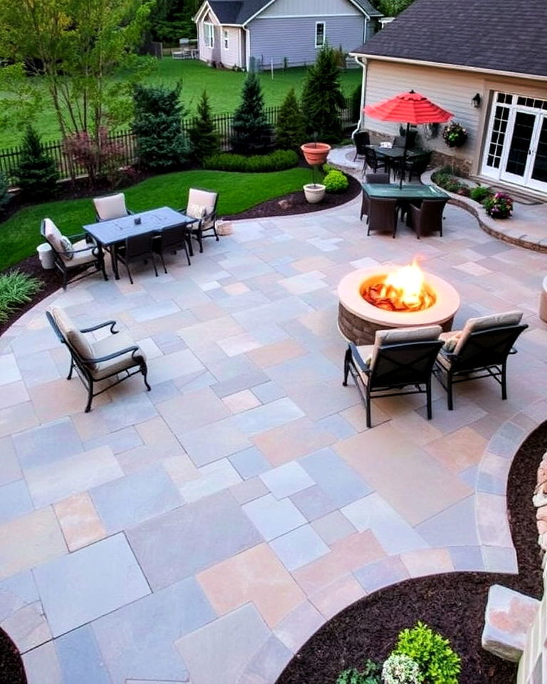 large stone patio with fire pit and dining area - 25 Stone Patio With a Fire Pit Ideas
