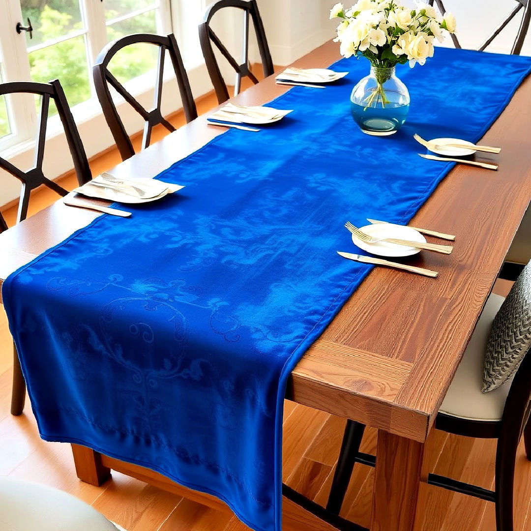luxurious blue velvet table runner - 40 Blue Dining Room Ideas