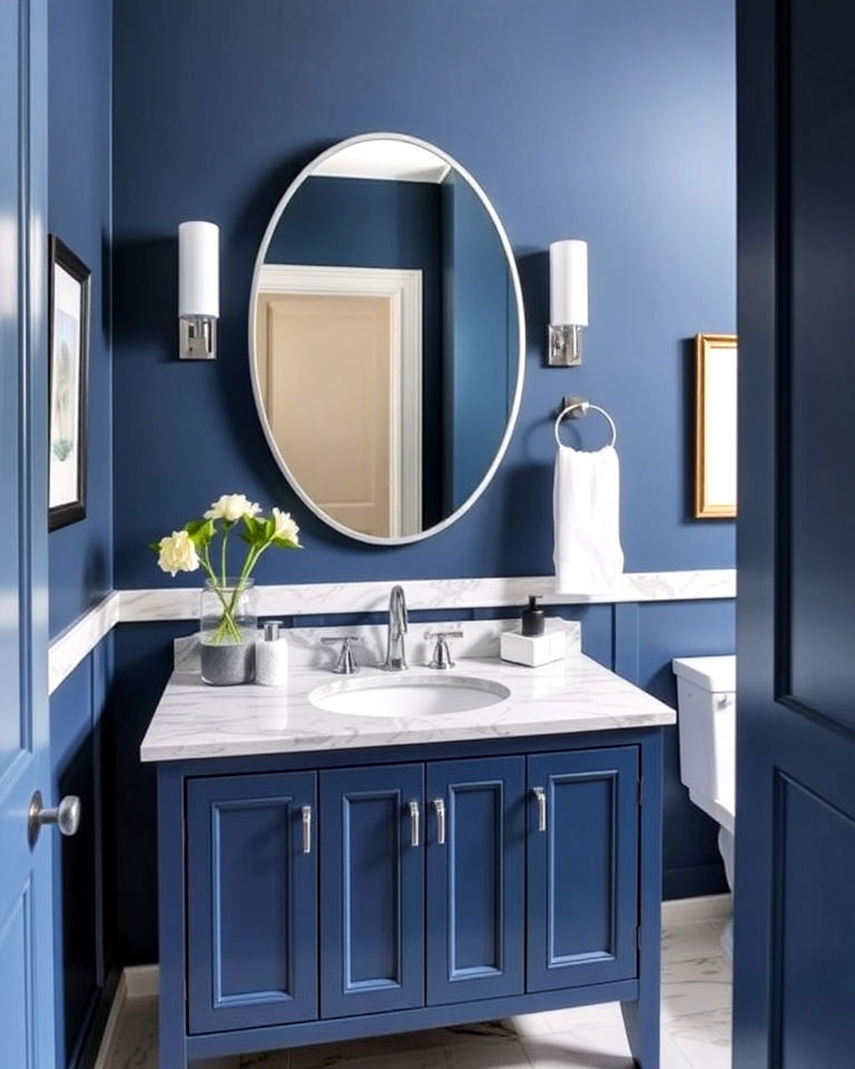 marble countertops and deep blue vanity - 20 Blue Powder Room Ideas