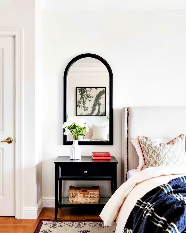 minimalist black framed mirror behind nightstand - 15 Mirror Behind Nightstand Design Ideas