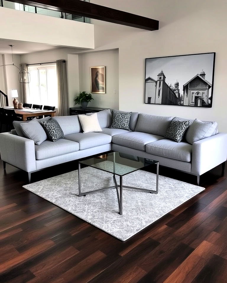 modern vibe grey sectional with dark wood flooring - 20 Grey Living Room With Dark Wood Floors