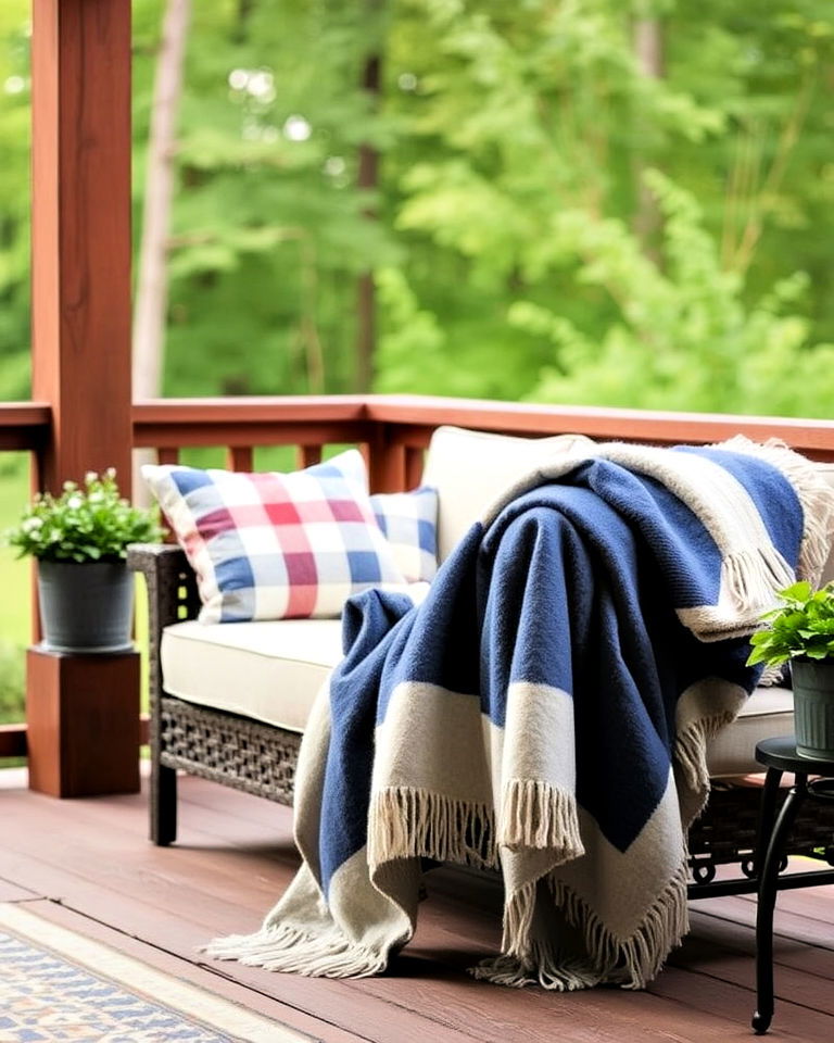 outdoor friendly cozy blankets - 25 Deck Decorating Ideas