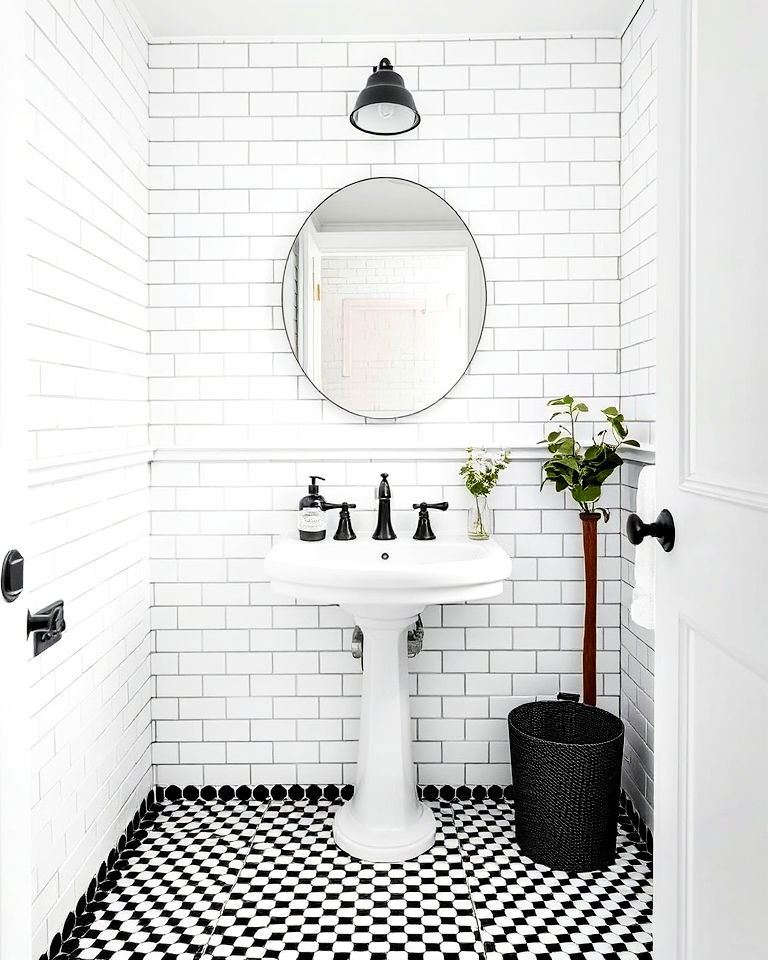 playful white tiles with black penny tile accents - 20 Black and White Powder Room Ideas
