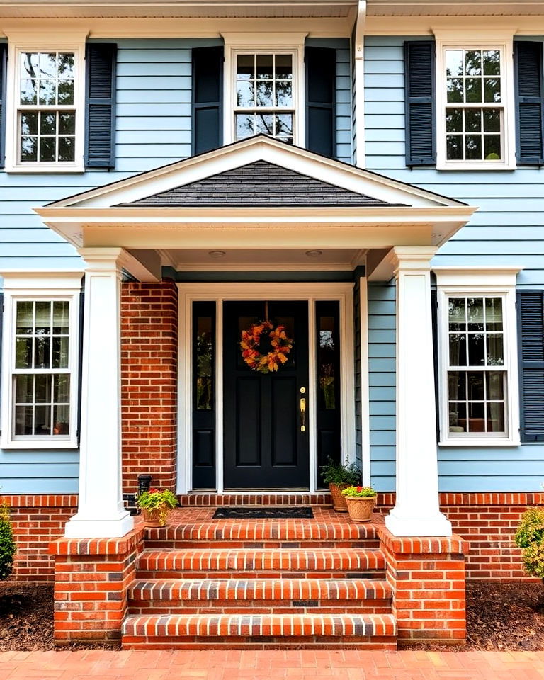 red brick detailing for light blue exterior - 25 Light Blue House Exterior Ideas