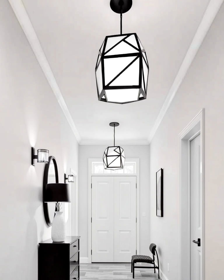 statement black and white geometric lighting - 20 Black and White Hallway Ideas