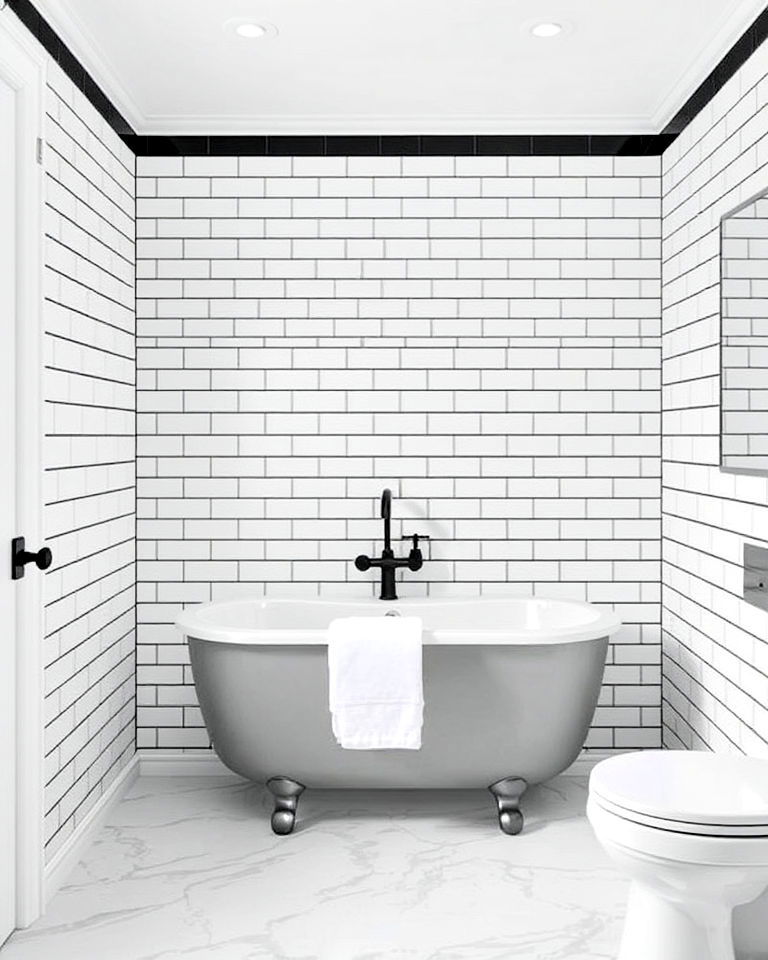 white subway tiles with black grout - 20 Black and White Bathroom Tile Ideas