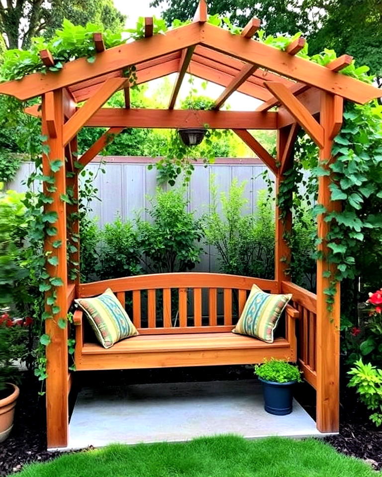 wooden garden arbor with built in bench - 40 Garden Arbor Ideas