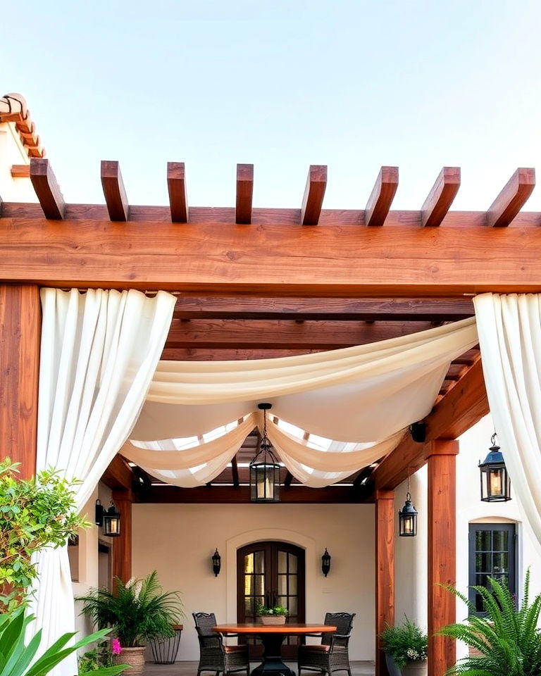 wooden pergola with draped fabric - 40 Spanish Style Home Exterior Ideas