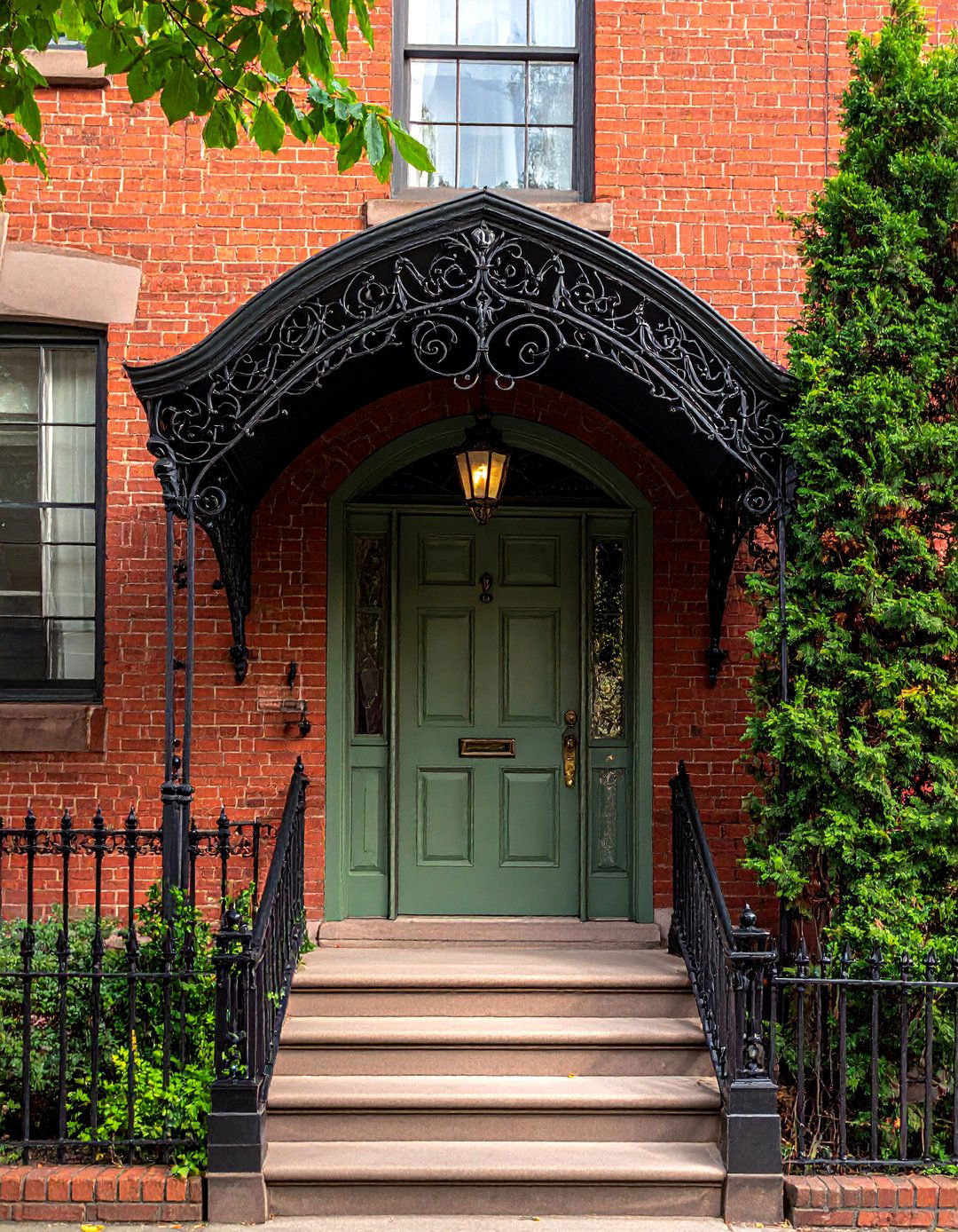 Arched Metal Front Door Canopy - 20 Front Door Canopy Ideas for a Welcoming Entrance