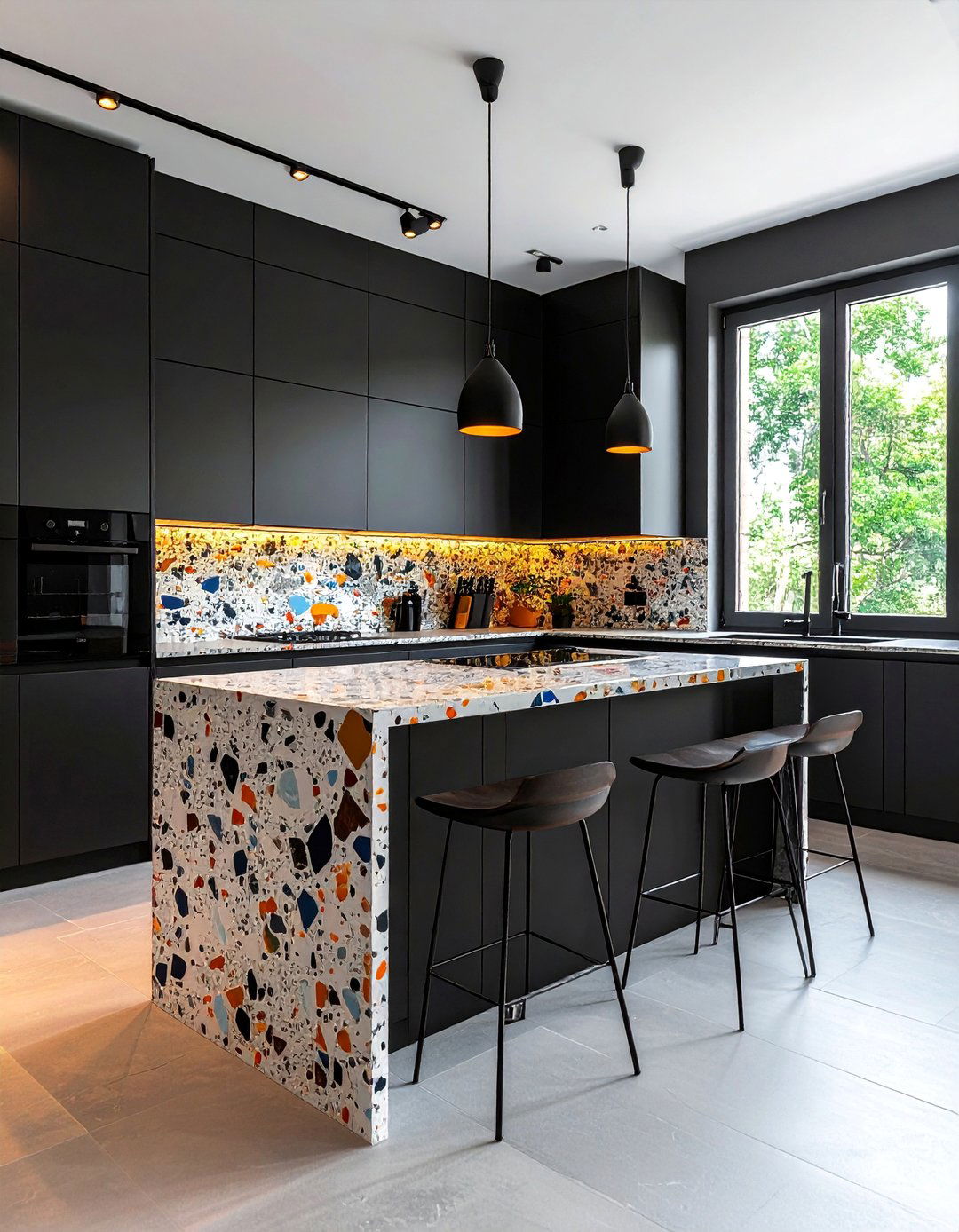 Black Kitchen with a Terrazzo Countertop and Backsplash - 40 Black Kitchen Ideas for a Sleek and Sophisticated Look