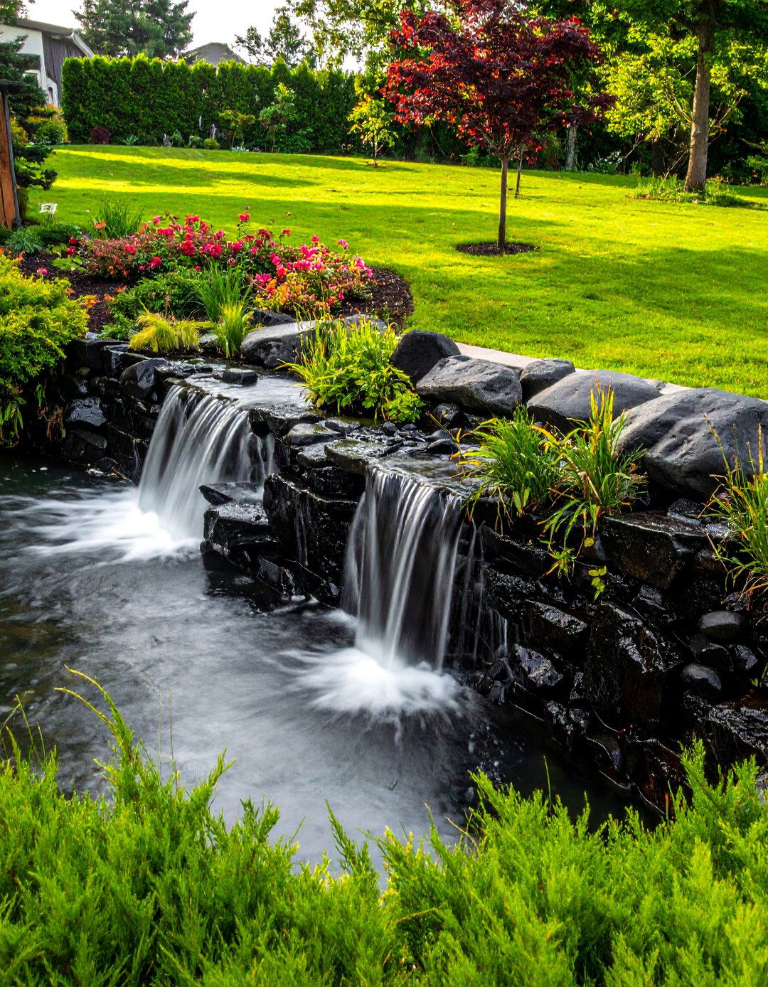 Black River Rock for a Waterfall Spillway - 20 Black River Rock Landscaping Ideas for a Unique Look