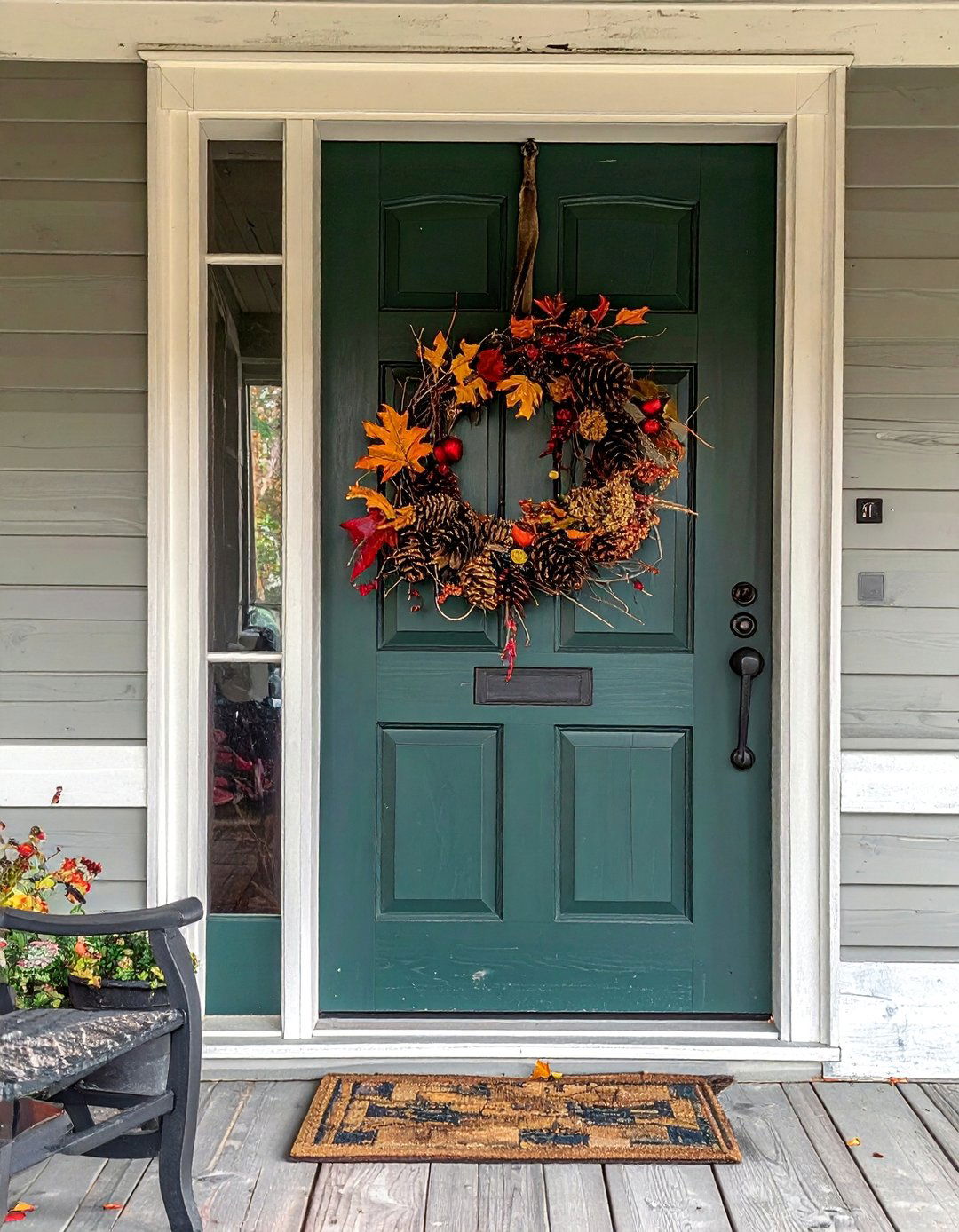 Decorating a Rustic Front Porch with Seasonal Wreaths - 25 Rustic Front Porch Ideas for a Welcoming Entryway