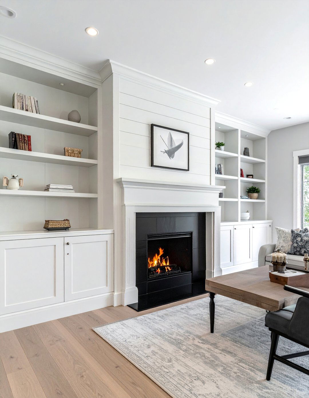 Floor to Ceiling Black Shiplap Fireplace Flanked by White Built Ins - 40 Black Shiplap Fireplace Ideas for a Bold and Cozy Focal Point