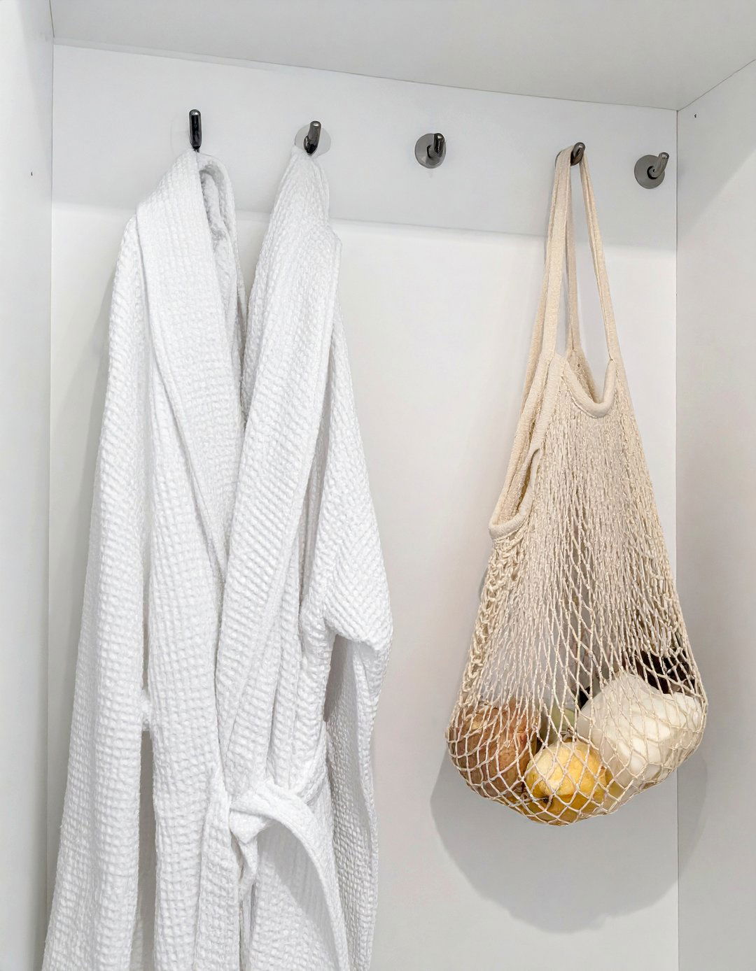 Install Wall Mounted Hooks Inside the Closet - 30 Linen Closet Organization Ideas for a Tidy Home