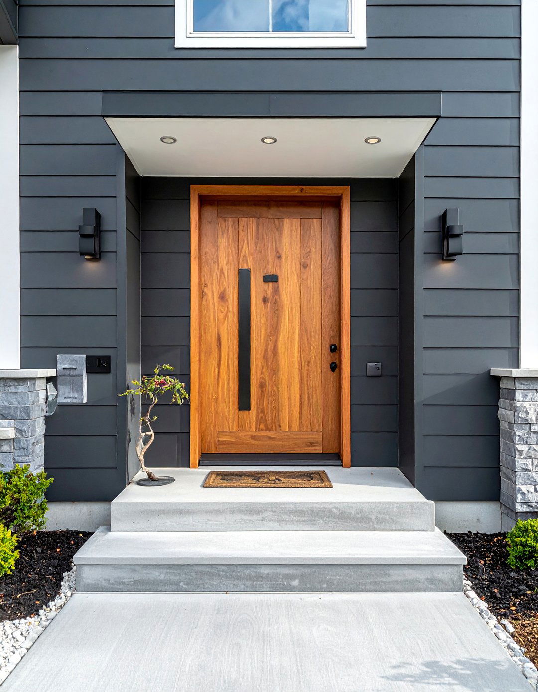Modern Front Porch with Oversized House Numbers - 25 Modern Front Porch Ideas for a Welcoming Entrance