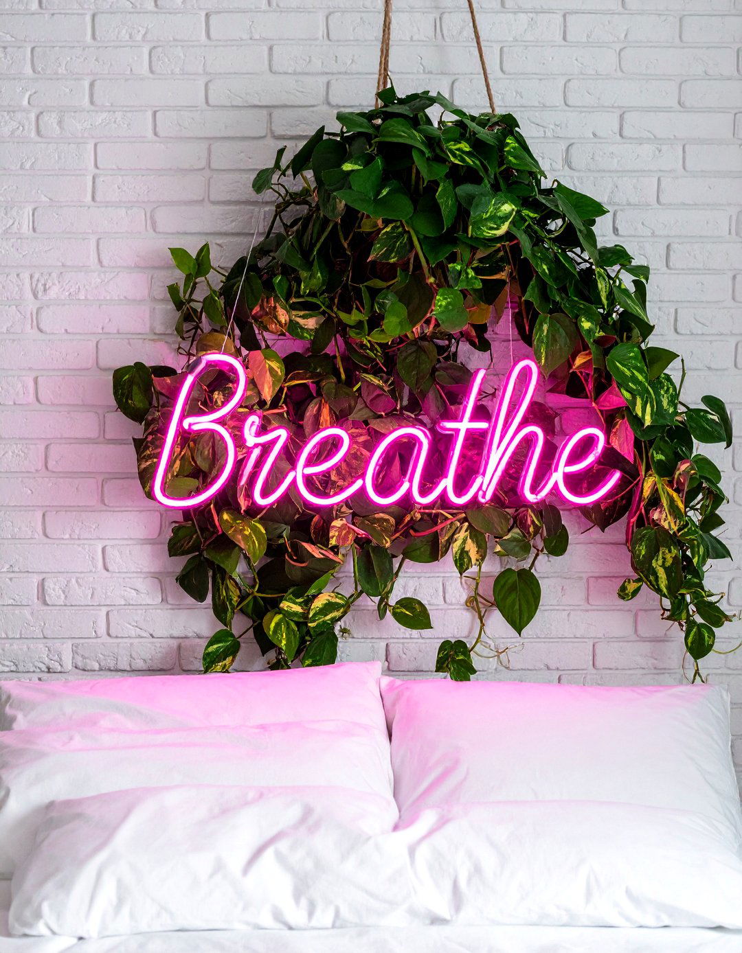 Neon Sign Paired with Greenery - 30 Neon Bedroom Ideas to Brighten Your Space
