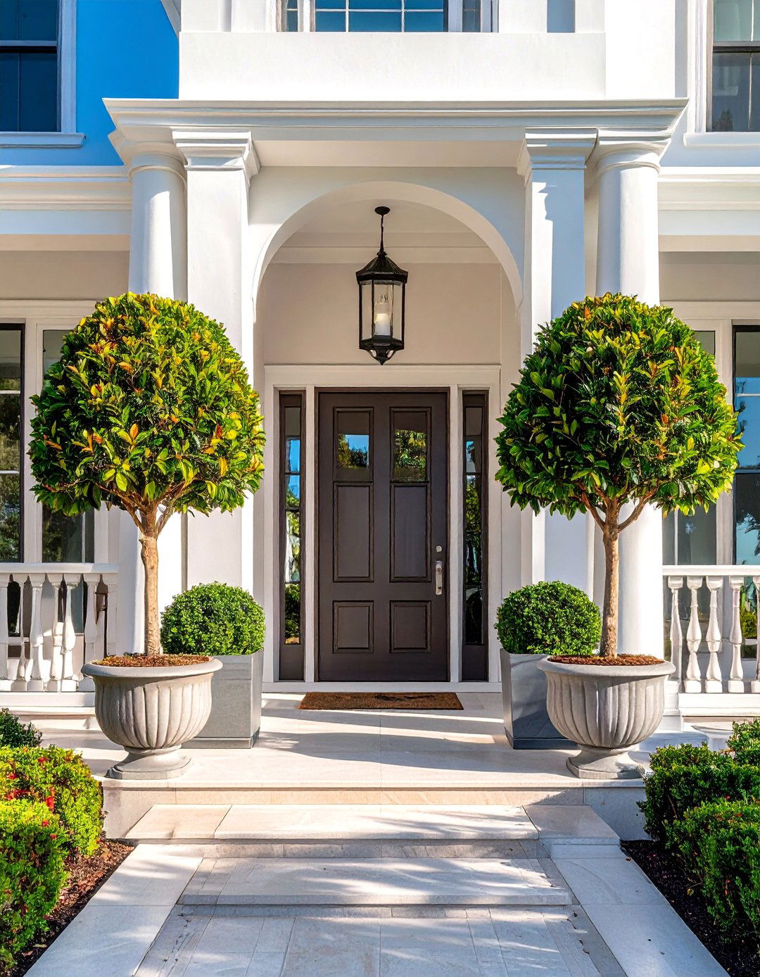 Potted Artificial Trees Flanking an Entryway - 20 Landscaping With Artificial Plants Ideas