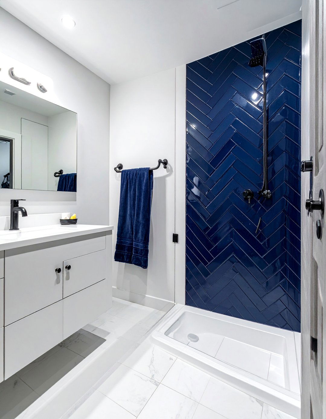 Walk in Shower with a Herringbone Tile Accent Wall - 30 Walk-in Shower Tile Ideas for a Luxurious Bathroom