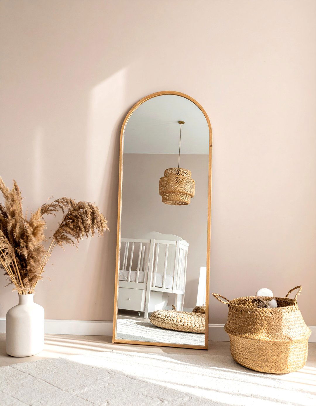 A Full Length Mirror with a Natural Wood Frame - 30 Boho Nursery Ideas for a Cozy and Stylish Space