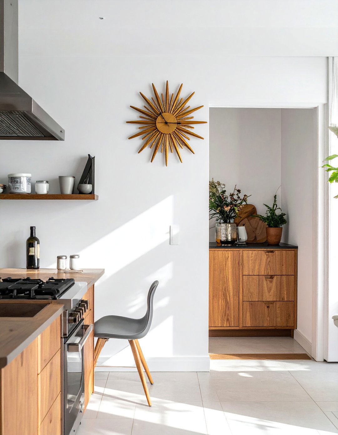 A Mid century Modern Kitchen with a Starburst Wall Clock - 40 Mid-century Modern Kitchen Ideas for a Retro Vibe
