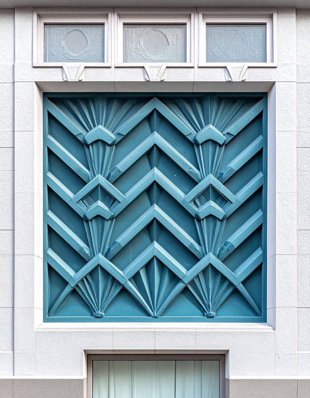 Art Deco House Exterior with Geometric Relief Panels