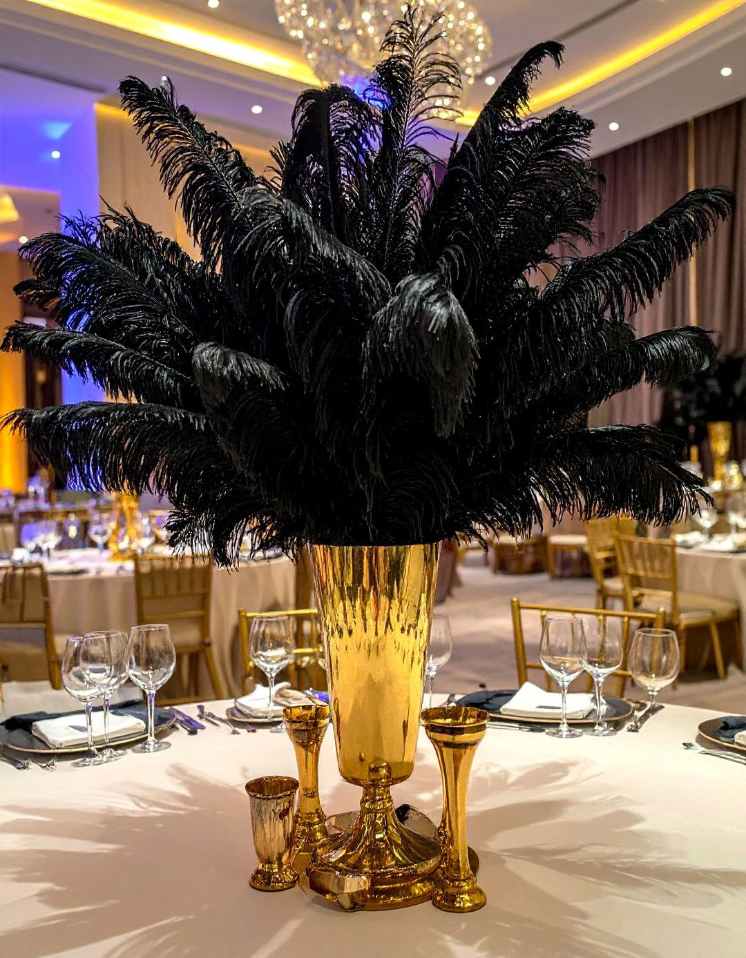 Black Feather and Gold Vase Centerpiece - 20 Black and Gold Centerpiece Ideas for Elegant Tables