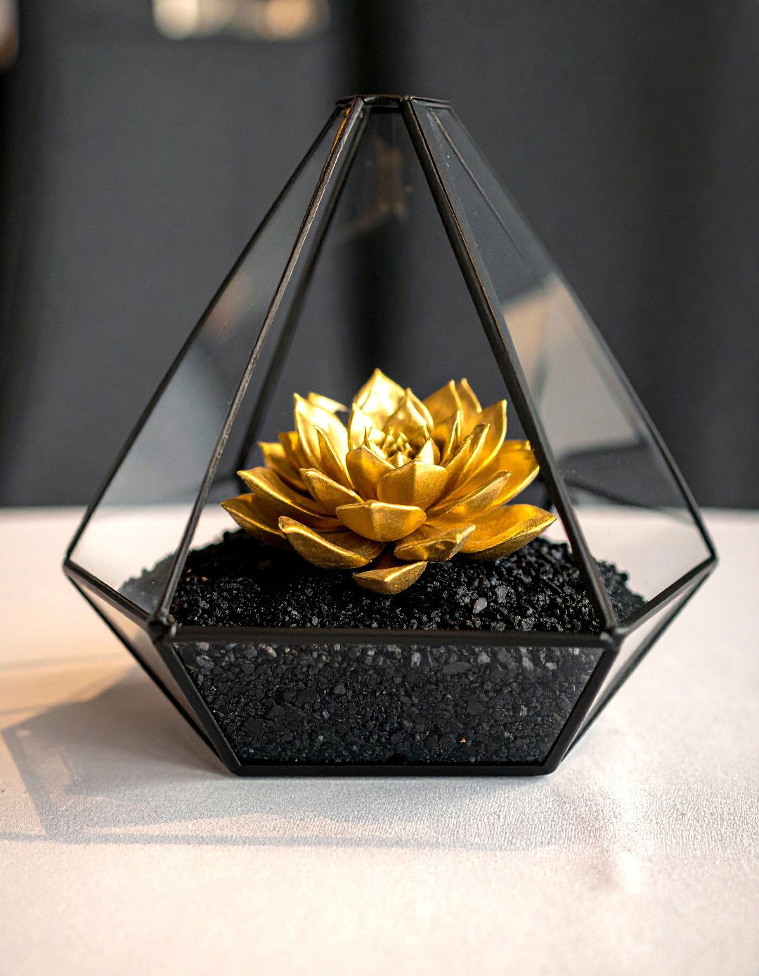 Black and Gold Geometric Terrarium Centerpiece - 20 Black and Gold Centerpiece Ideas for Elegant Tables