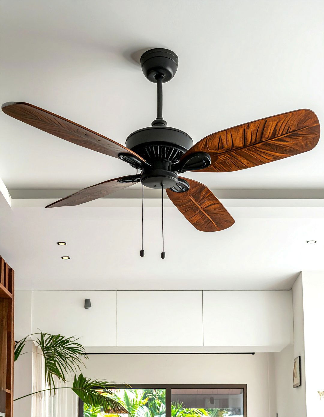 Ceiling Fans with Leaf Shaped Blades - 25 Tropical Living Room Ideas for a Relaxing Vibe