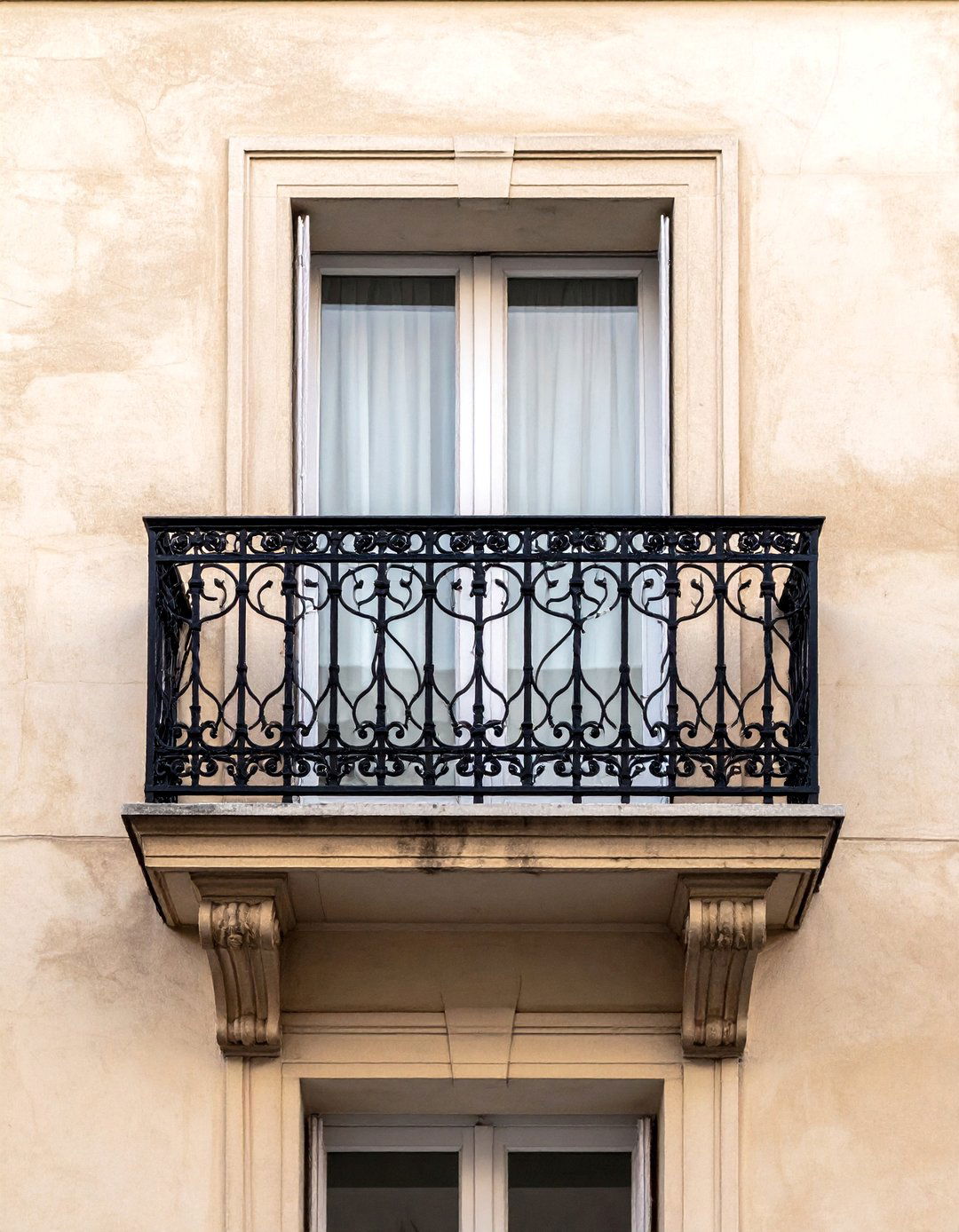 Classic Wrought Iron French Balcony - 25 French Balcony Ideas for a Charming Outdoor Space