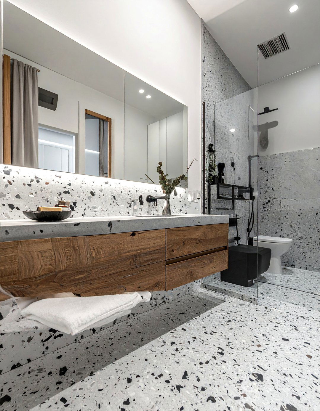Grey Terrazzo with Black Flecks - 20 Black and Grey Bathroom Ideas for a Stylish Retreat
