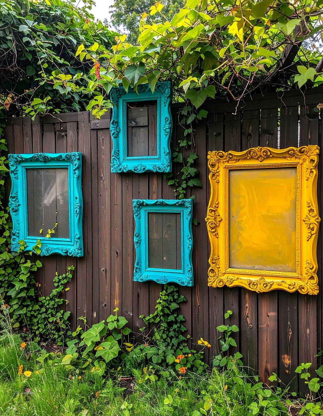 Hanging Picture Frame Fence Art - 20 Fence Art Ideas to Beautify Your Outdoor Space