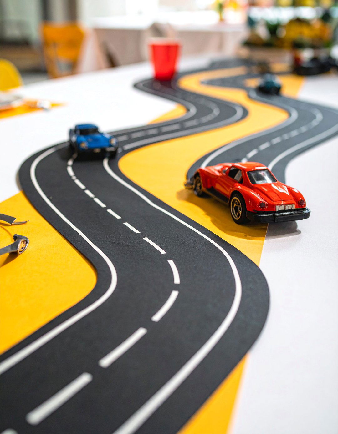 Hot Wheels Racetrack Table Runner - 25 Hot Wheels Birthday Party Ideas for Car-Loving Kids